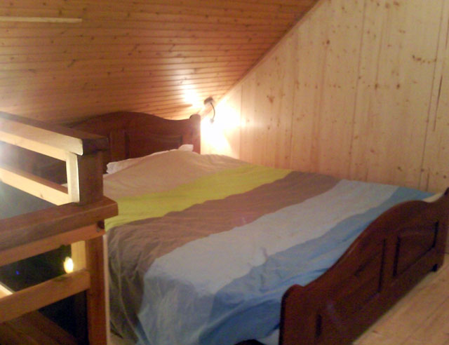 La chambre en mezzanine